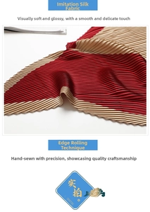 Close-up of pleated silk scarf texture featuring red and champagne gold stripes