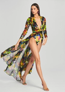 Detailed view of the deep V-neck and vibrant smudge print on this flowing maxi dress