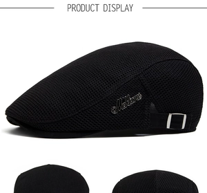 Detail of breathable honeycomb mesh fabric and silver metal logo on black summer cap
