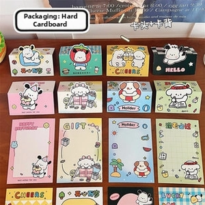 Flat lay of colorful cartoon cardboard gift cards with dog patterns on wooden table