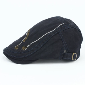 Classic navy cotton ivy cap with white stitching and gold embroidery detail