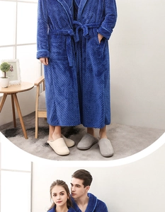 Detail of dark blue waffle textured flannel bathrobe with waist tie and pockets
