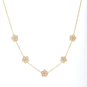 French vintage style gold plated flower necklace with pearl luster petals on white background