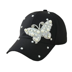 Damen Sonnenhut in Schwarz mit großem Perlen-Schmetterling und funkelnden Strass-Details