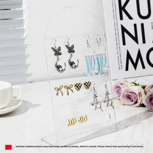 L-shaped acrylic earring holder featuring 126 holes for jewelry storage and display