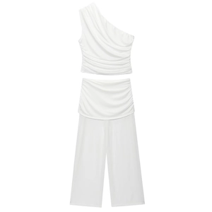 White two-piece set featuring a one-shoulder pleated top and high-waisted wide-leg pants