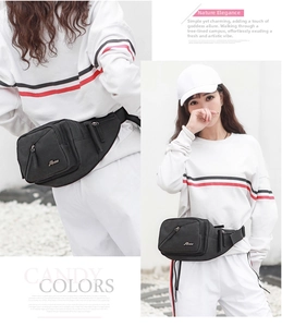 Close-up of black multifunctional waist bag with water bottle holder and adjustable strap