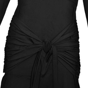 Detail shot of the twisted waist design and pleated black fabric on a formal dress
