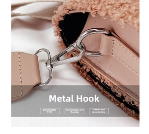 Detail of pink-brown lamb wool bag showing the silver metal hook and leather texture