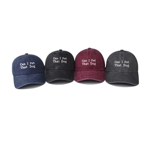 Washed cotton baseball caps in four colors with Can I Pet That Dog embroidery detail