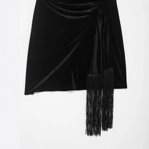 Elegant black velvet mini dress featuring tassel fringe details and ruched texture