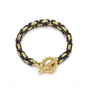 Detail showing dimensions of black and gold stainless steel chain bracelet with toggle clasp