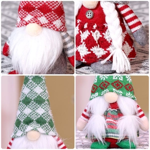 Handmade knitted Christmas gnomes with long white beards and festive plush decoration