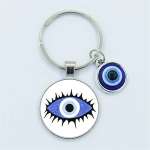 Blue Turkish evil eye keychain with silver alloy pendants and glass beads