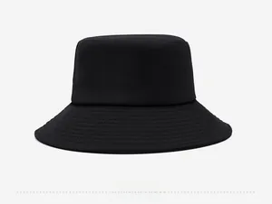 Detail view of the back side texture and stitching on a black canvas bucket hat
