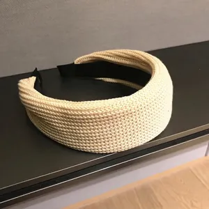 Chic beige wide knit headband for women featuring textured ribbed wool for autumn fashion