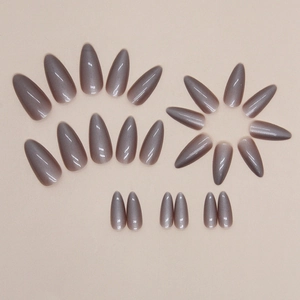 Sparkly mauve cat eye almond press-on nails with velvet gradient finish and glitter