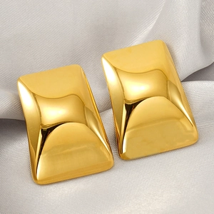 Polished 18k gold plated stainless steel rectangular stud earrings on white silk background