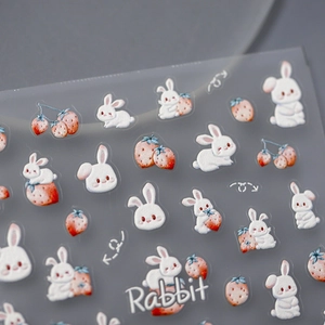 3D embossed nail stickers featuring cute white rabbits and strawberries on clear film