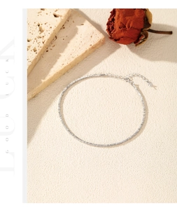 Detail of S925 sterling silver chain with adjustable clasp next to dried flower