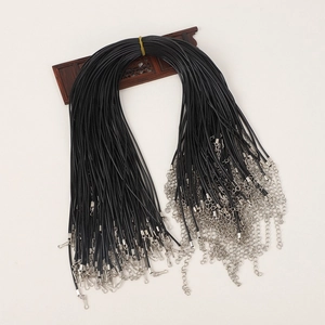 Black wax cord necklaces with silver lobster clasps and extenders on a wooden display