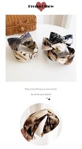 Detail view of printed fabric headbands with marble patterns and vintage tie-dye textures