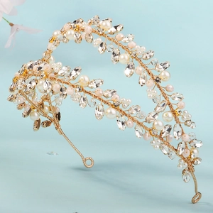 Handmade bridal headband with crystals pearls and pink beads on a gold floral wire