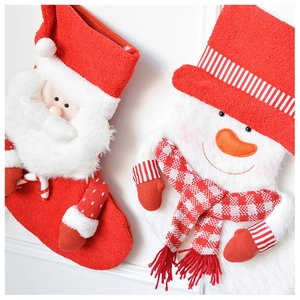 Detailed view of plush 3D Santa and snowman on a thick knitted Christmas stocking gift bag