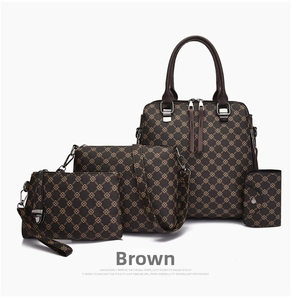 Detailed view of 4-piece brown printed handbag set with silver zipper and monogram pattern