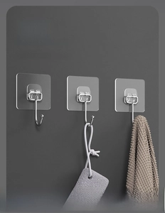 Strong adhesive transparent wall hook for bathroom accessories showing high load capacity