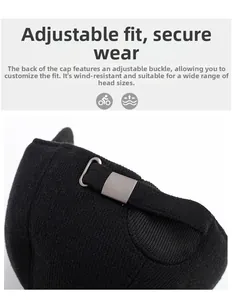Detail of adjustable metal buckle and thick knitted texture on a winter baseball cap