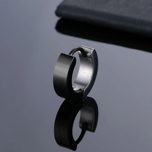 Polished black stainless steel huggie hoop earring for men with a mirror reflection