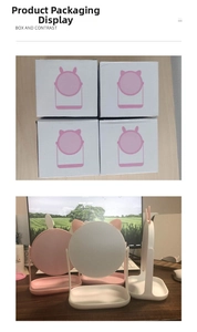 Detail view of cute cat and rabbit ear desktop mirrors with base storage tray and packaging