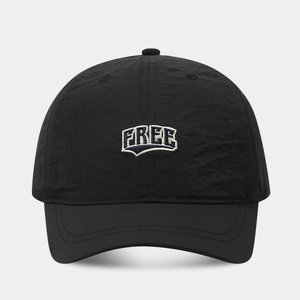 Detail of embroidered FREE text on lightweight black quick-dry baseball cap fabric