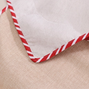 Christmas burlap table runner with red striped border and white fleece details