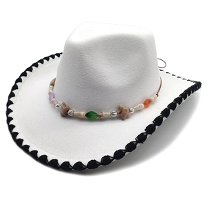 White felt western cowboy hat with ethnic beaded band and black stitched rolled brim