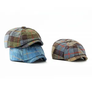 Classic checkered wool newsboy caps for men and women in various vintage patterns
