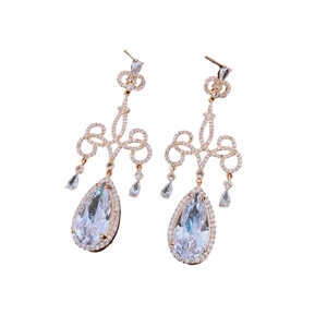 Boucles d'oreilles goutte en or rose avec zircons scintillants et cristaux pavés vintage