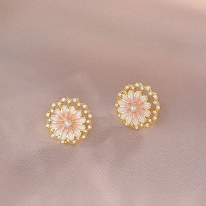 Elegant daisy stud earrings with pink enamel petals, center pearl and cubic zirconia halo