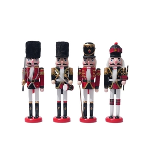 Set of four classic wooden Nutcracker soldier figurines in red, black, and gold colors