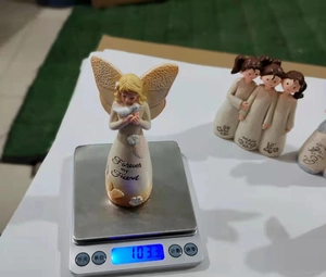 Weight measurement of a resin angel sculpture featuring Forever my Friend text