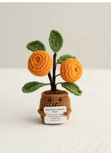 Handmade crochet orange emotional support plant in pot with inspirational message card