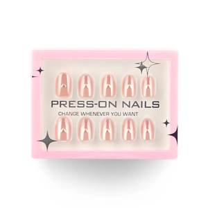 Glossy nude short almond press-on nails with golden heart charms in pink gift box