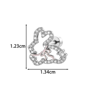 Sparkling silver rabbit bow cartilage stud with pink zircons on white background