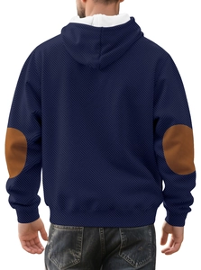 Detail view of men hoodie showing dark blue fabric and brown oval elbow patches