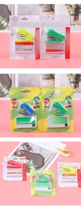 Mini stapler set detail showing colorful assorted office staplers with staples