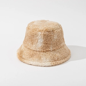 Close-up of the soft tie-dye sherpa texture on this warm winter bucket hat for women