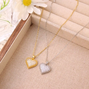 Sparkling heart necklace set in gold and silver finish with pavé zircon stones