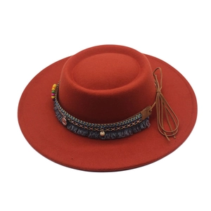 Flat top felt boater hat in rust red with colorful bohemian beaded tassel ribbon