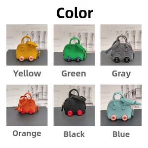 Mini car-shaped coin purses in six colors made of textured faux leather with small wheels